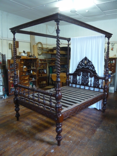 Heavily carved Anglo Indian bed